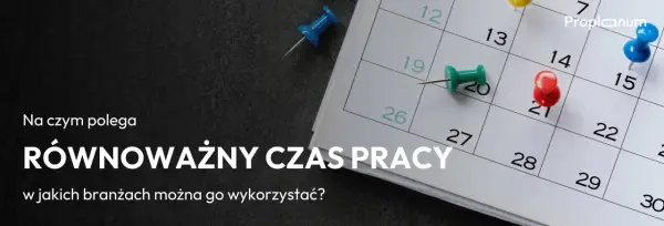 Zbliżenie na kalendarz z kolorowymi pinezkami zaznaczającymi dni.