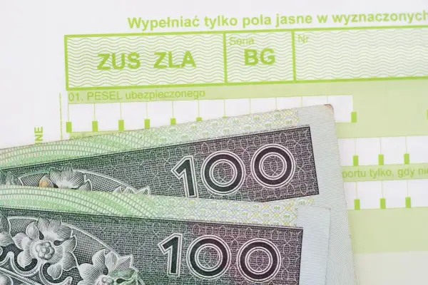 ZUS ZLA i banknoty 100 zł. Czy to kod a na zwolnieniu lekarskim, czy może wynagrodzenie?